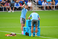 This is a picture of soccer players hydrating