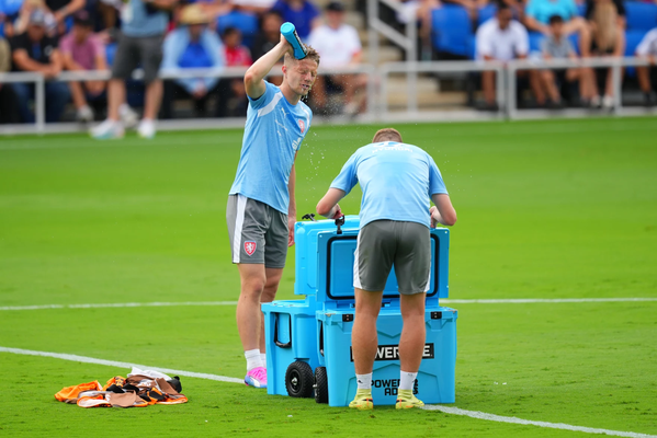 This is a picture of soccer players hydrating